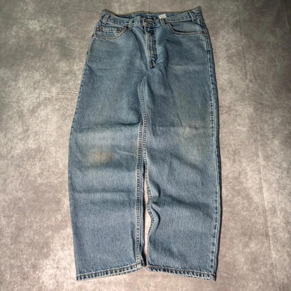 Vintage Levis 550 Relaxed Fit Tapered Leg Jeans Light Wash Blue 36x29 Mens 90s